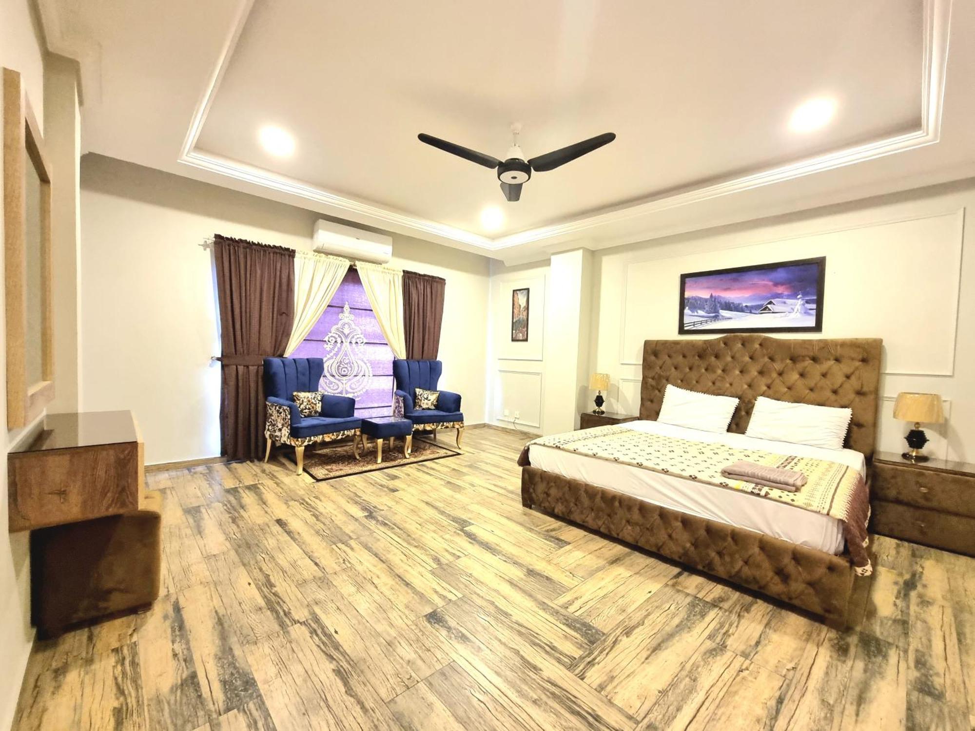 The Millenial Apartments & Suites Bahria Town Ravalpindi Szoba fotó