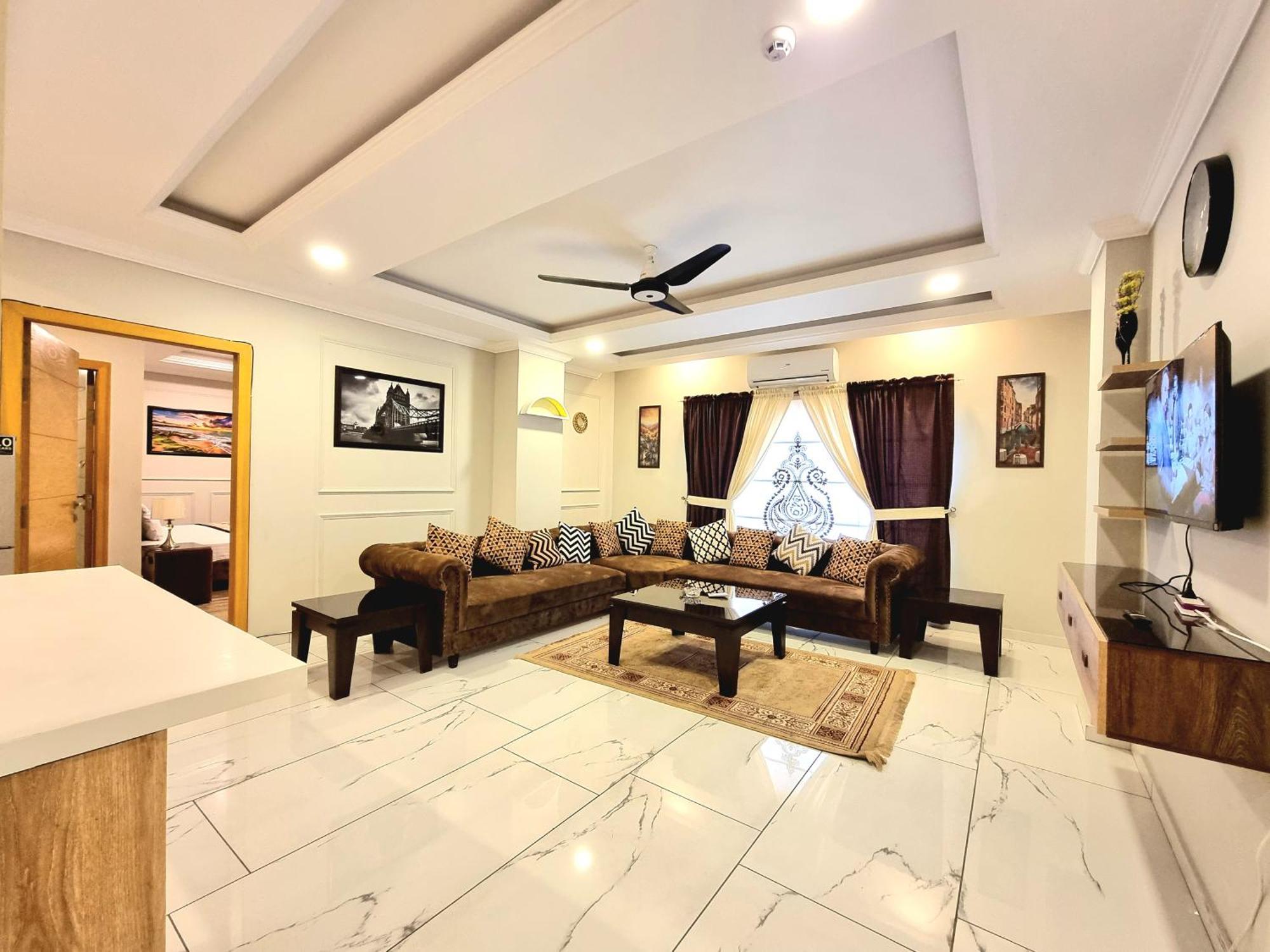 The Millenial Apartments & Suites Bahria Town Ravalpindi Szoba fotó