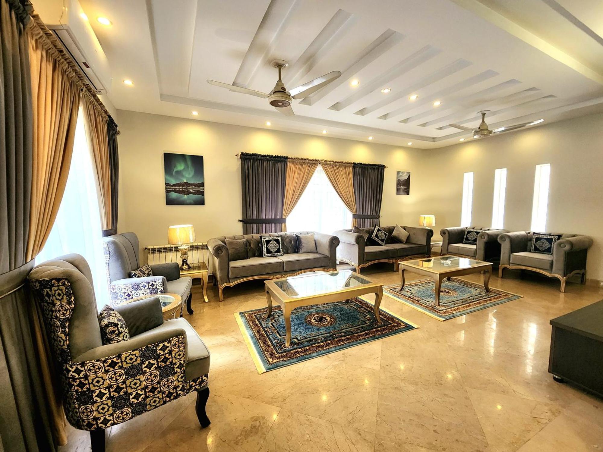 The Millenial Apartments & Suites Bahria Town Ravalpindi Szoba fotó