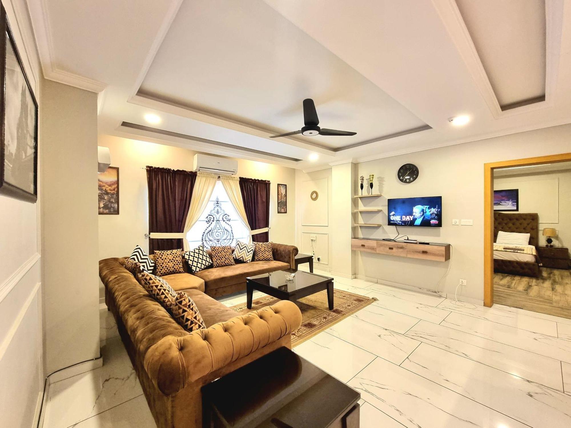 The Millenial Apartments & Suites Bahria Town Ravalpindi Szoba fotó