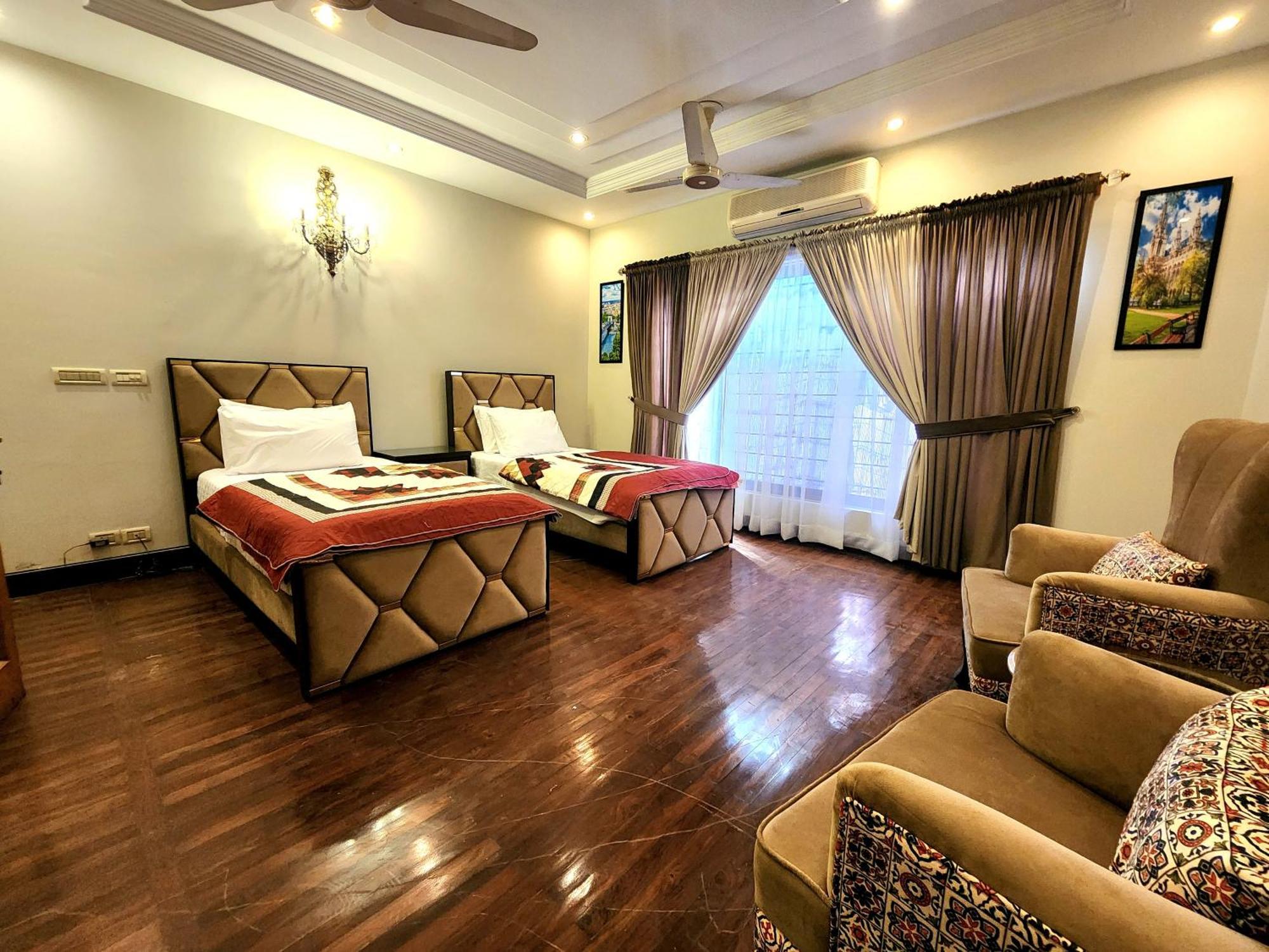 The Millenial Apartments & Suites Bahria Town Ravalpindi Szoba fotó