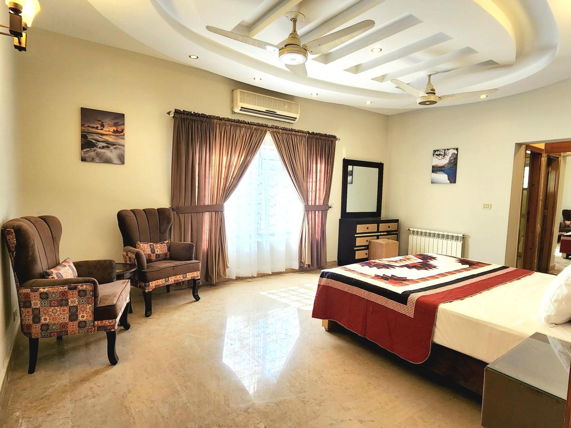 The Millenial Apartments & Suites Bahria Town Ravalpindi Szoba fotó