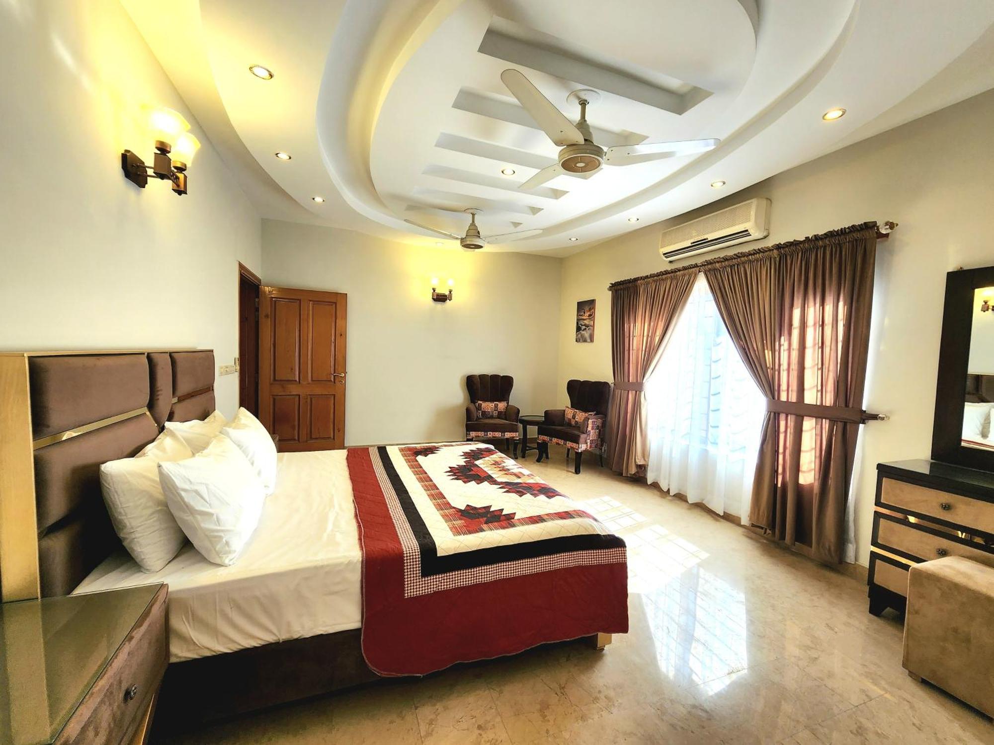 The Millenial Apartments & Suites Bahria Town Ravalpindi Szoba fotó