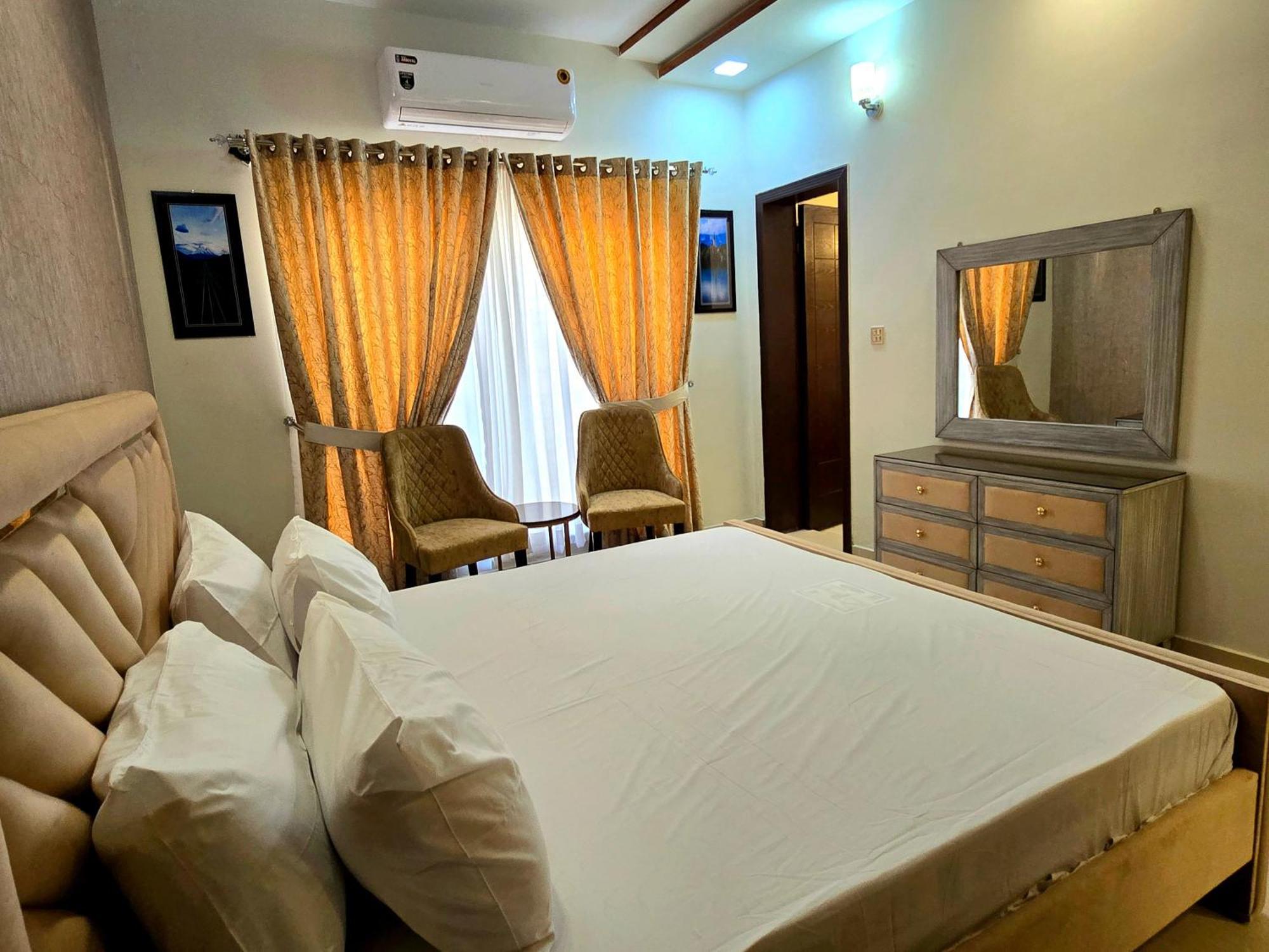The Millenial Apartments & Suites Bahria Town Ravalpindi Szoba fotó